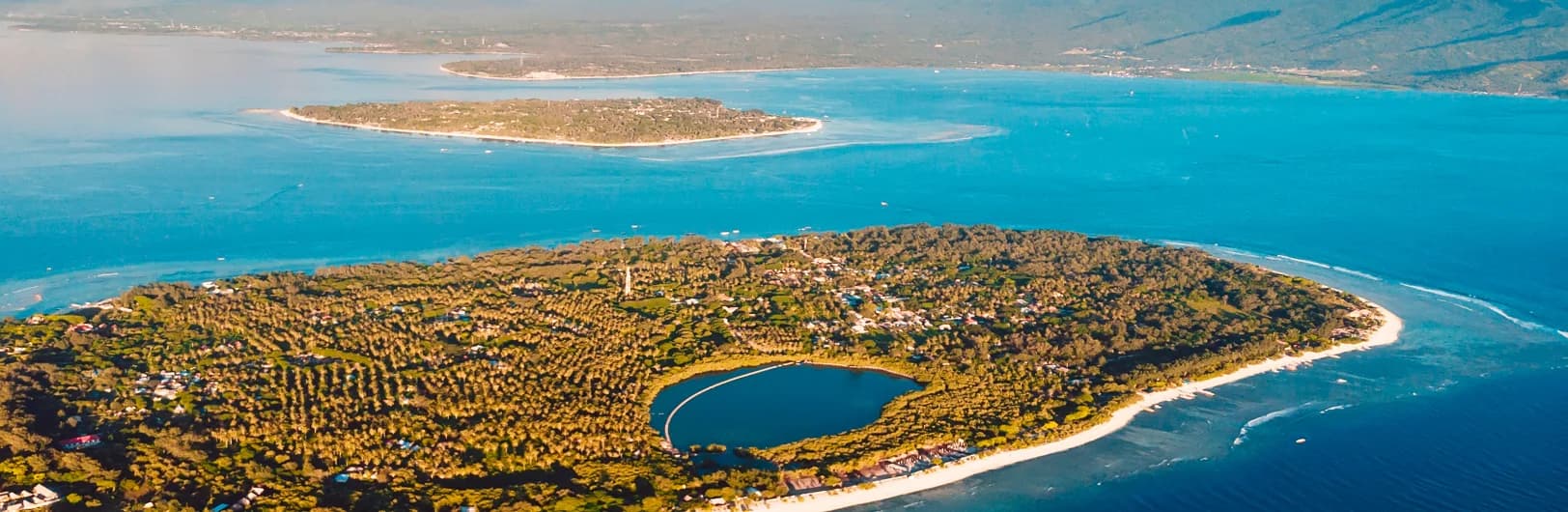 Gili Islands Bali - tropical beachfront bungalows with turquoise waters, coral reefs, and car-free island paradise near Lombok Indonesia