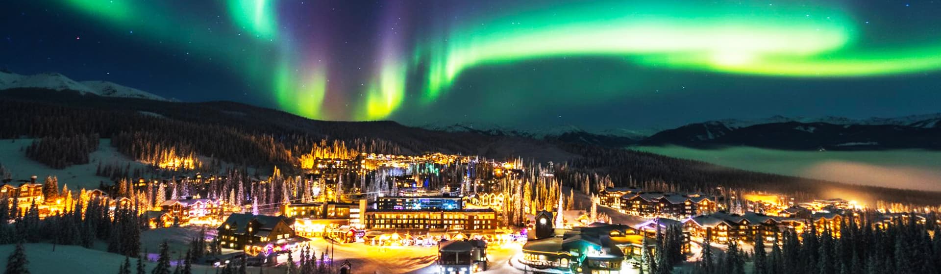 Canadian Rockies ski resorts panoramic view with snow-covered peaks, Whistler Blackcomb slopes, Lake Louise turquoise lake, world-class powder skiing, and pristine British Columbia and Alberta mountain landscapes