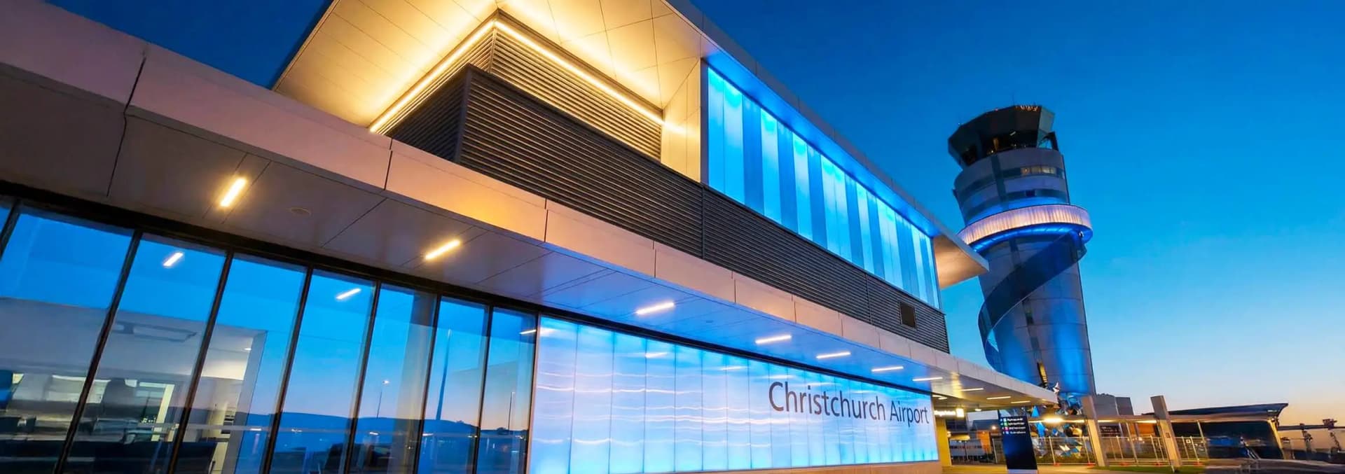 Christchurch International Airport CHC New Zealand - modern terminal building with Air New Zealand flights, gateway to South Island adventures, rental car facilities including Hertz and Avis, airport hotels for transit stays, Canterbury Plains location, and connection hub for Queenstown, Aoraki Mount Cook, and Milford Sound travel