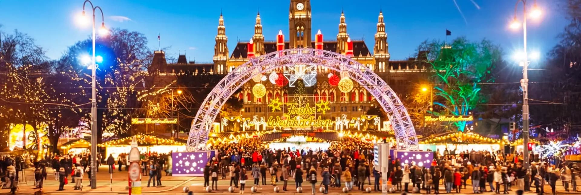 Vienna Rathausplatz Christmas market with City Hall illuminated and decorated stalls