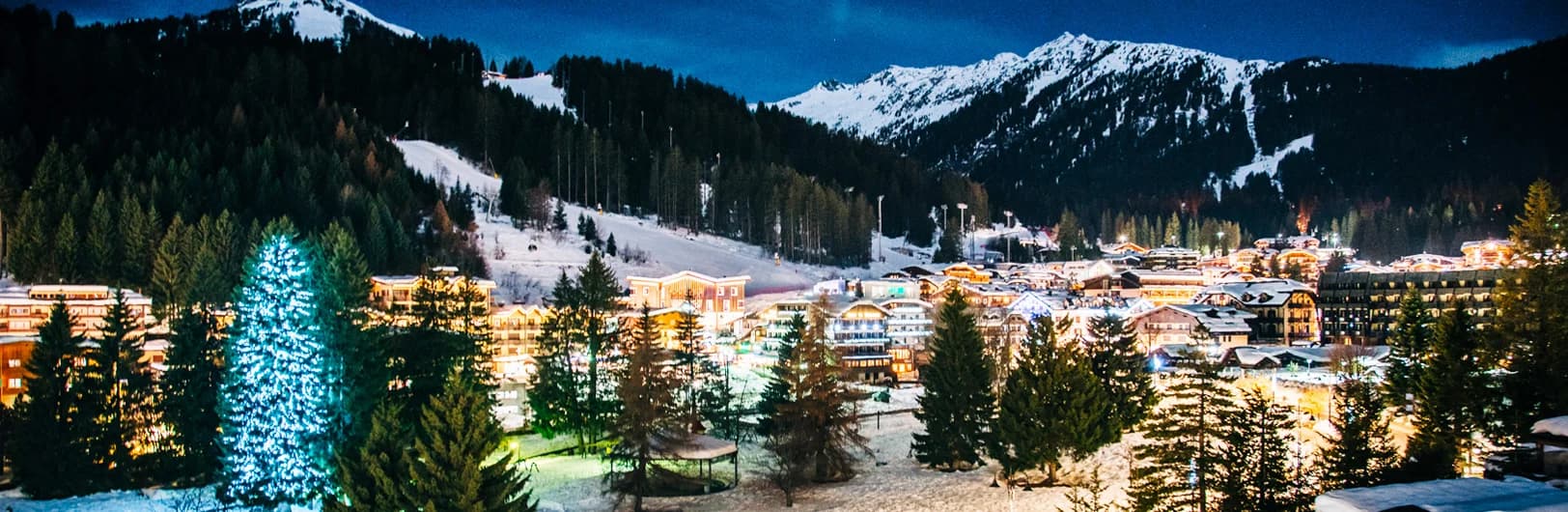 Madonna di Campiglio ski resort in Brenta Dolomites with elegant pedestrian village, World Cup 3-Tre slalom course, snow-covered slopes and luxury Italian Alpine hotels