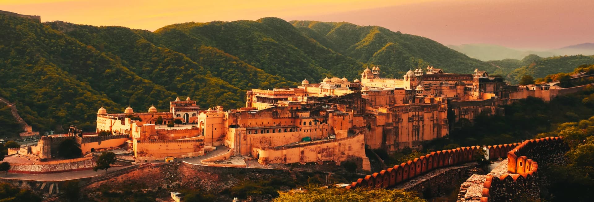 Rajasthan India in November 2025 - Pushkar Camel Fair cultural festival, illuminated Amber Fort in Jaipur, City Palace architecture, desert safari in Thar Desert, and Udaipur Lake Palace during perfect weather best time to visit India