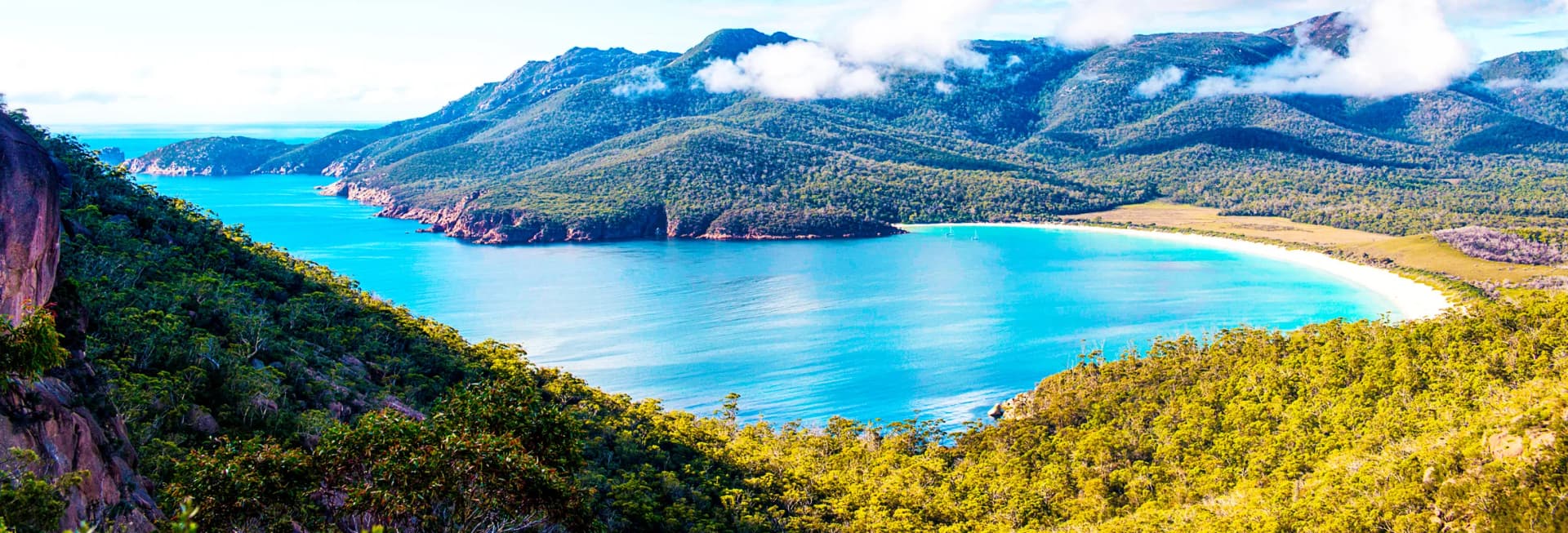 Tasmania Australia in November 2025 - pristine Wineglass Bay white sand beach, Cradle Mountain alpine scenery and hiking trails, MONA museum contemporary art, Bruny Island wildlife and gourmet food, Freycinet National Park coastal views during spring best time to visit