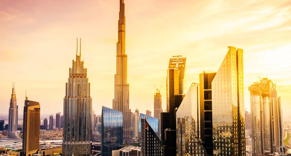 Luxury Dubai cityscape with Burj Khalifa, modern architecture, desert backdrop and futuristic urban development
