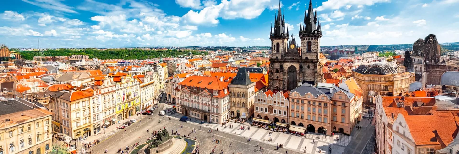 Old Town Prague Staré Město 2026 - stunning view of medieval cobblestone streets, the famous Astronomical Clock Orloj on Old Town Hall, Gothic Týn Church towers, colorful Baroque townhouses, bustling tourist square with outdoor cafes, historic architecture dating to 9th century, heart of Prague's UNESCO World Heritage zone ideal for first-time visitors and history enthusiasts