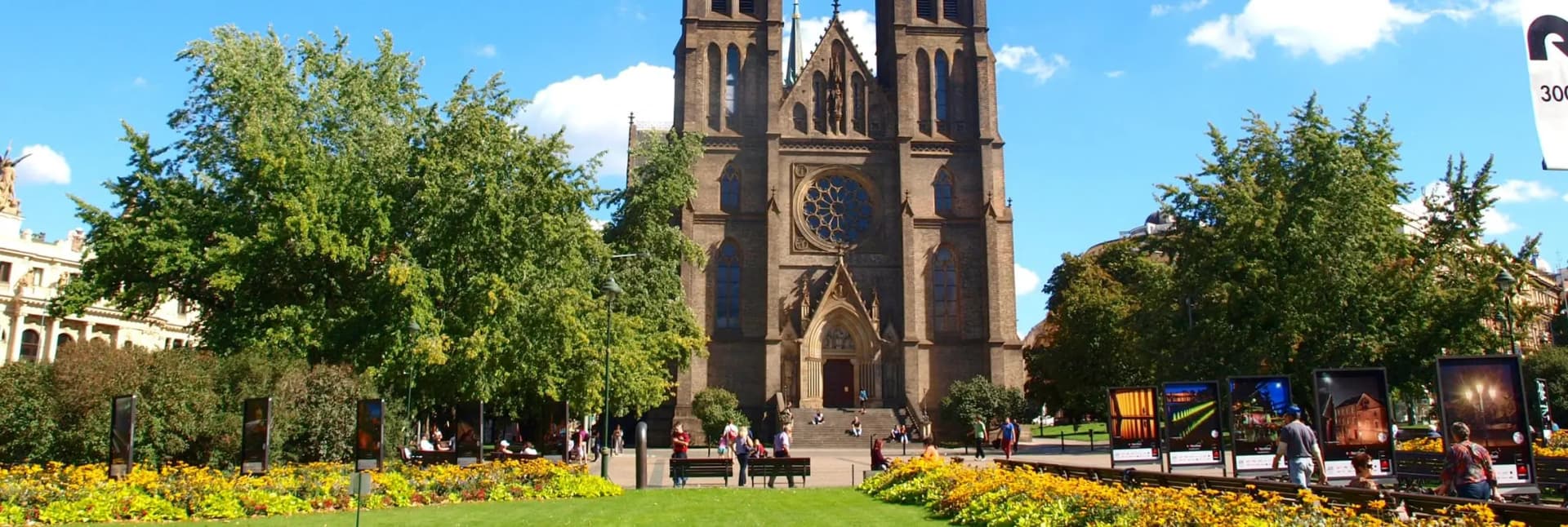 Vinohrady Prague 2026 - trendy residential neighborhood with elegant Art Nouveau apartment buildings, tree-lined Náměstí Míru square, Peace Square Church, hip specialty coffee shops and wine bars, Riegrovy Sady park with panoramic city views, local farmers markets, authentic Prague experience away from tourist crowds, perfect for foodies and young travelers