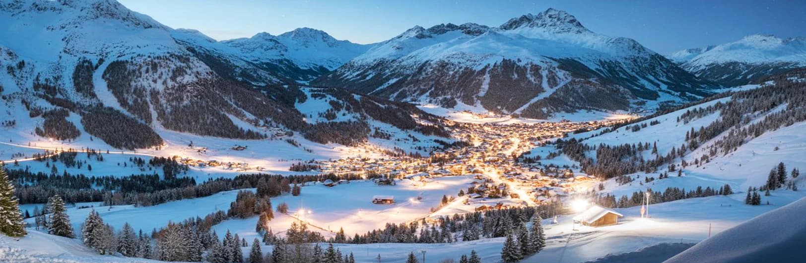 St. Anton am Arlberg Austria ski resort 2026 - snow-covered mountain peaks with ski lifts, expert off-piste terrain, and traditional Tyrolean Alpine village hotels