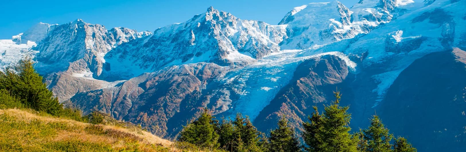 Chamonix Mont-Blanc ski resort France - dramatic view of Western Europe's highest peak Mont Blanc 4,810m, Aiguille du Midi cable car ascending to 3,842m, legendary Vallée Blanche 20km glacier descent, historic Alpine town, extreme off-piste freeride terrain, and interconnected ski areas for expert skiers 2026