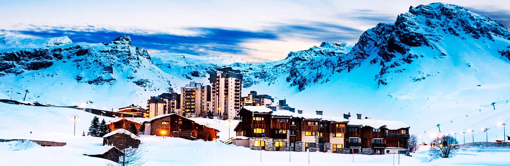 Tignes ski resort France - high-altitude Grande Motte glacier 3,456m with year-round summer skiing, Espace Killy 300km shared with Val d'Isère, purpose-built modern village at 2,100m elevation, snow-sure guaranteed conditions November to May, ski-in ski-out apartments, and beginner-friendly slopes 2026