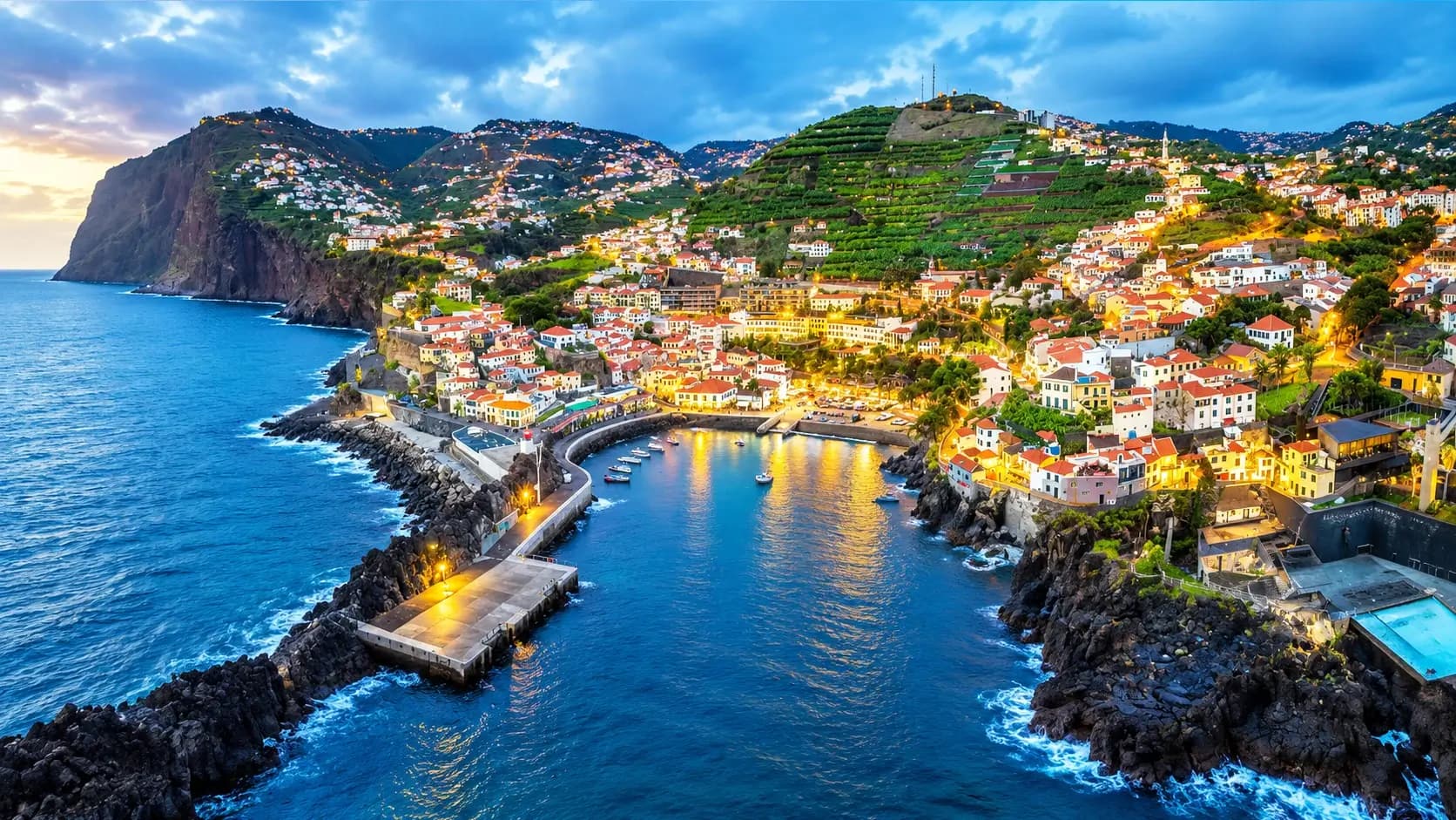 Camara de Lobos Madeira budget hotels 2026: authentic fishing village with colorful boats, whitewashed houses, Cabo Girao cliffs nearby - save 50% vs Funchal Centro with hotels from €69/night, 10 minutes by bus
