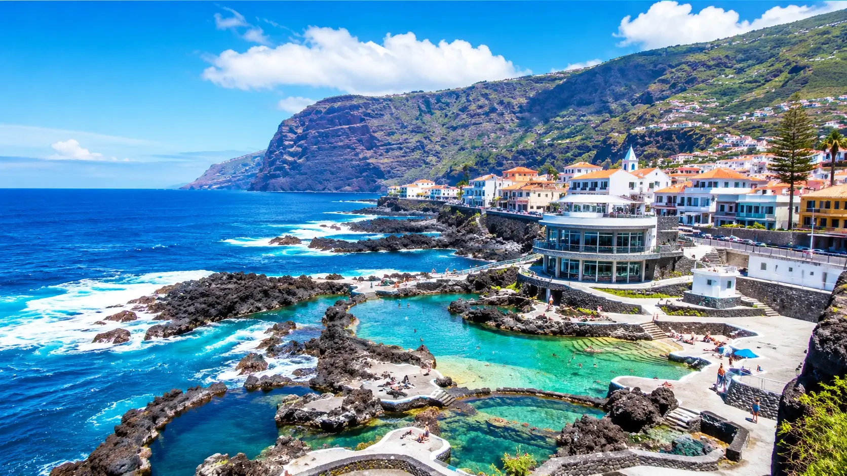 Porto Moniz natural pools Madeira 2026: FREE volcanic swimming pools with crystal-clear Atlantic water, dramatic lava rock formations, north coast mountains - hotels from €50/night, 1.5 hours scenic drive from Funchal