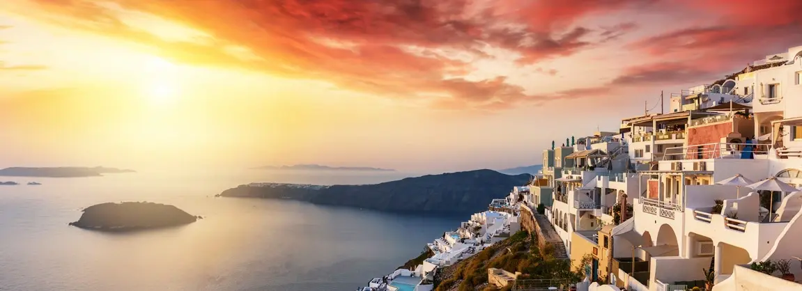 Imerovigli Santorini 2026 - highest village on the caldera with white-washed cave hotels overlooking the volcanic crater, Skaros Rock hiking trail, infinity pools at sunset, and panoramic Aegean Sea views