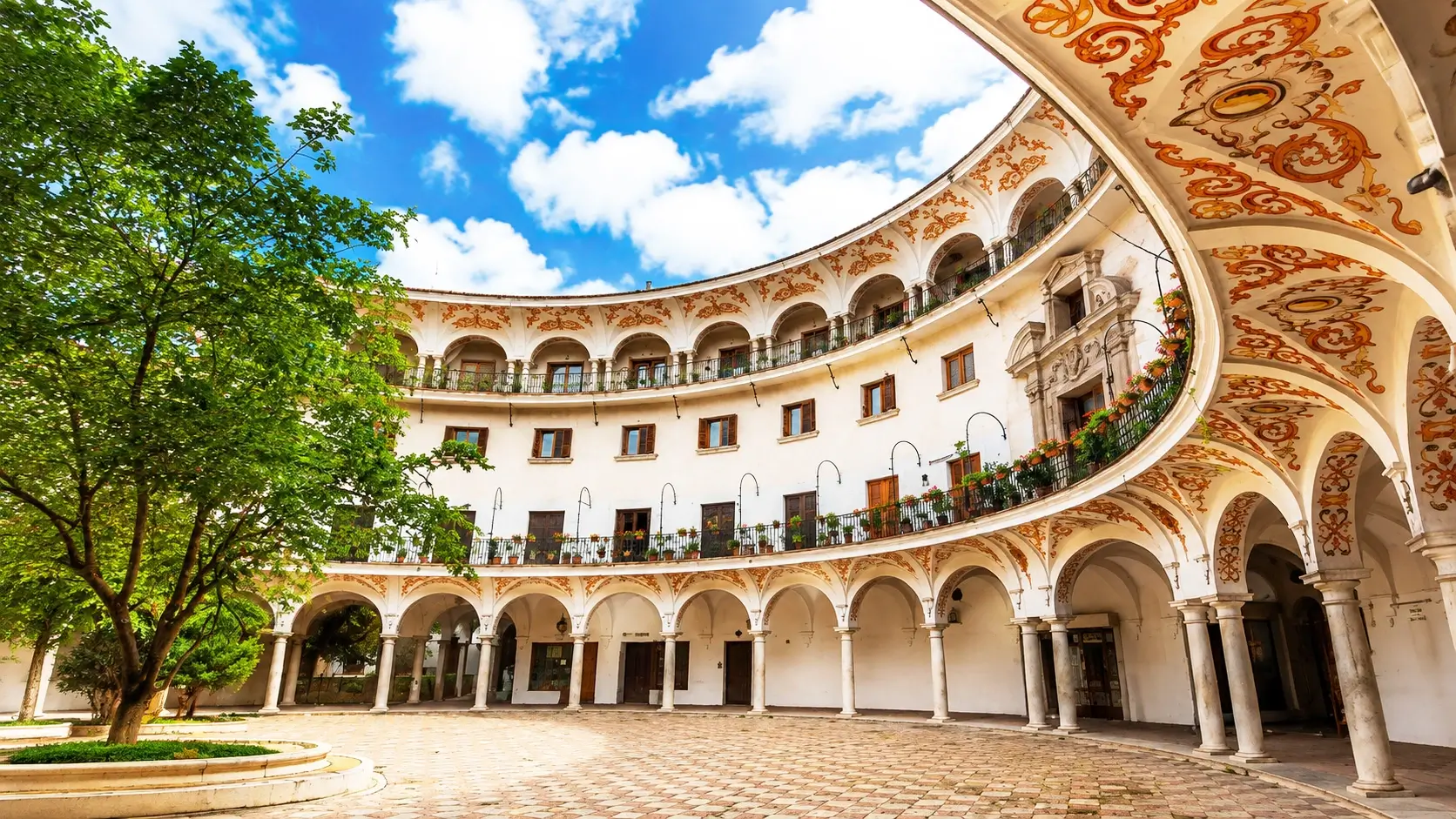 Best Seville hotels in El Arenal 2026: Torre del Oro golden tower on the Guadalquivir River, Plaza de Toros de la Maestranza bullring, riverside tapas bars and authentic flamenco venues, with mid-range hotels from €60/night near the city center