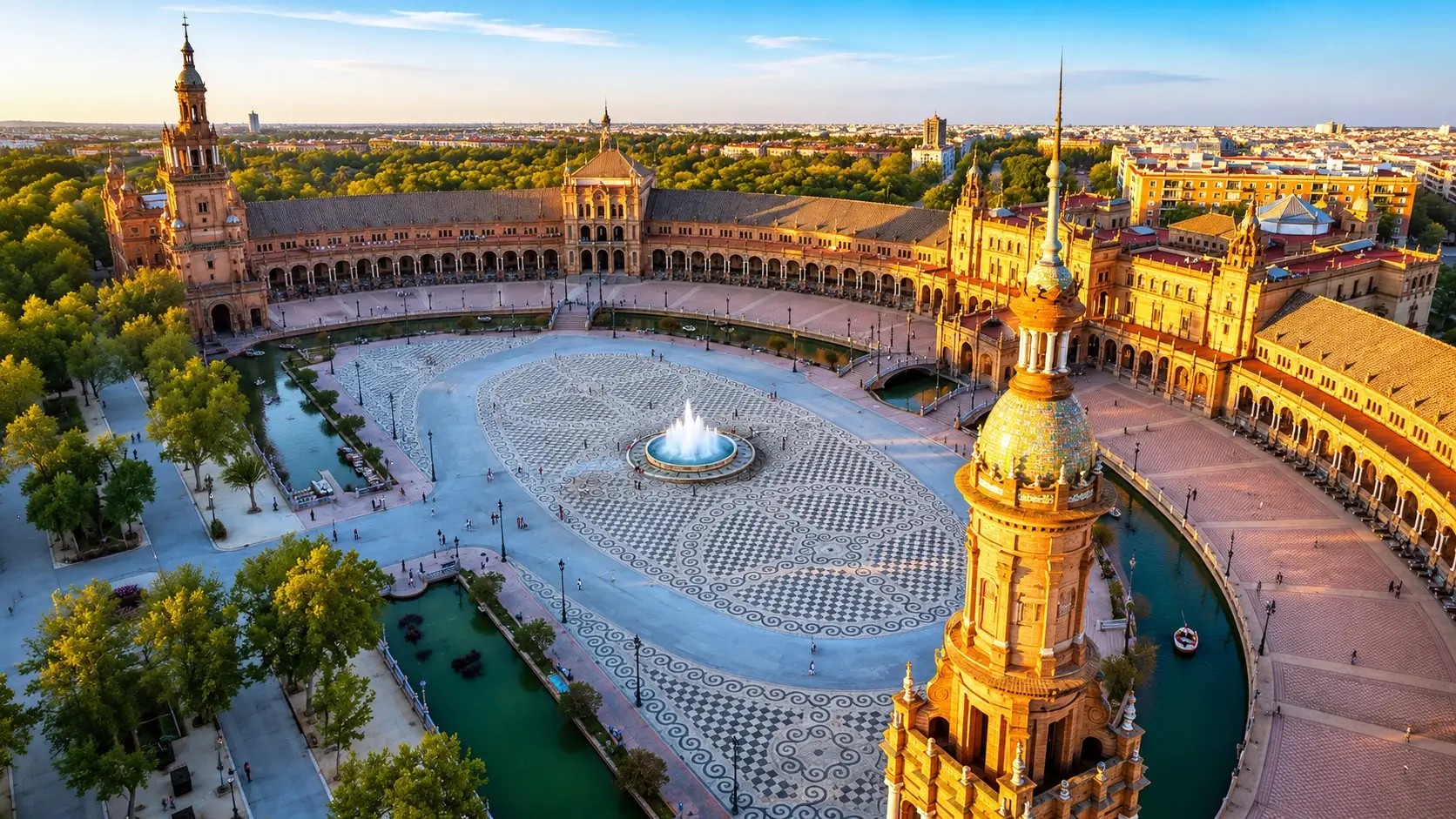 Seville Spain travel guide 2026 showing the iconic Plaza de España with Renaissance Revival architecture and ceramic tile alcoves, Real Alcazar Mudejar palace gardens, the Gothic Cathedral with Giralda bell tower, and Guadalquivir River at golden hour - best time to visit Seville
