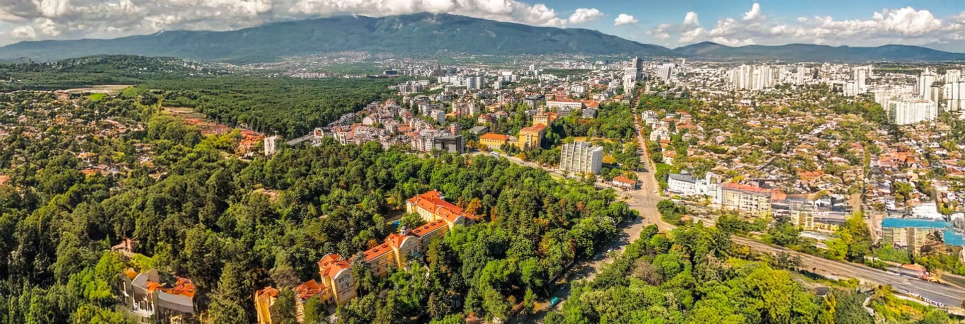 Lozenets neighborhood Sofia Bulgaria 2026 - upscale residential district near South Park with tree-lined James Bourchier Boulevard, traditional Bulgarian mehana restaurants, budget hotels €45-70 per night, 8 minutes metro to city center - best area for local atmosphere and parks