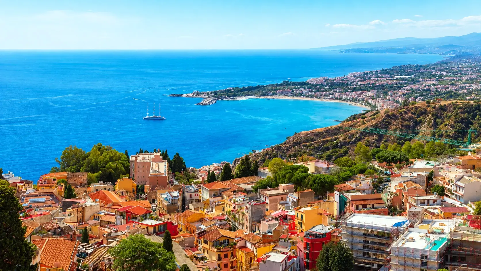 Castelmola village hotels Taormina Sicily 2026 - medieval mountaintop borgo perched above Taormina with cobblestone streets, 360-degree panoramic Mount Etna and Ionian Sea views, famous Bar Turrisi almond wine, romantic boutique B&Bs from €80 per night, peaceful escape from tourist crowds