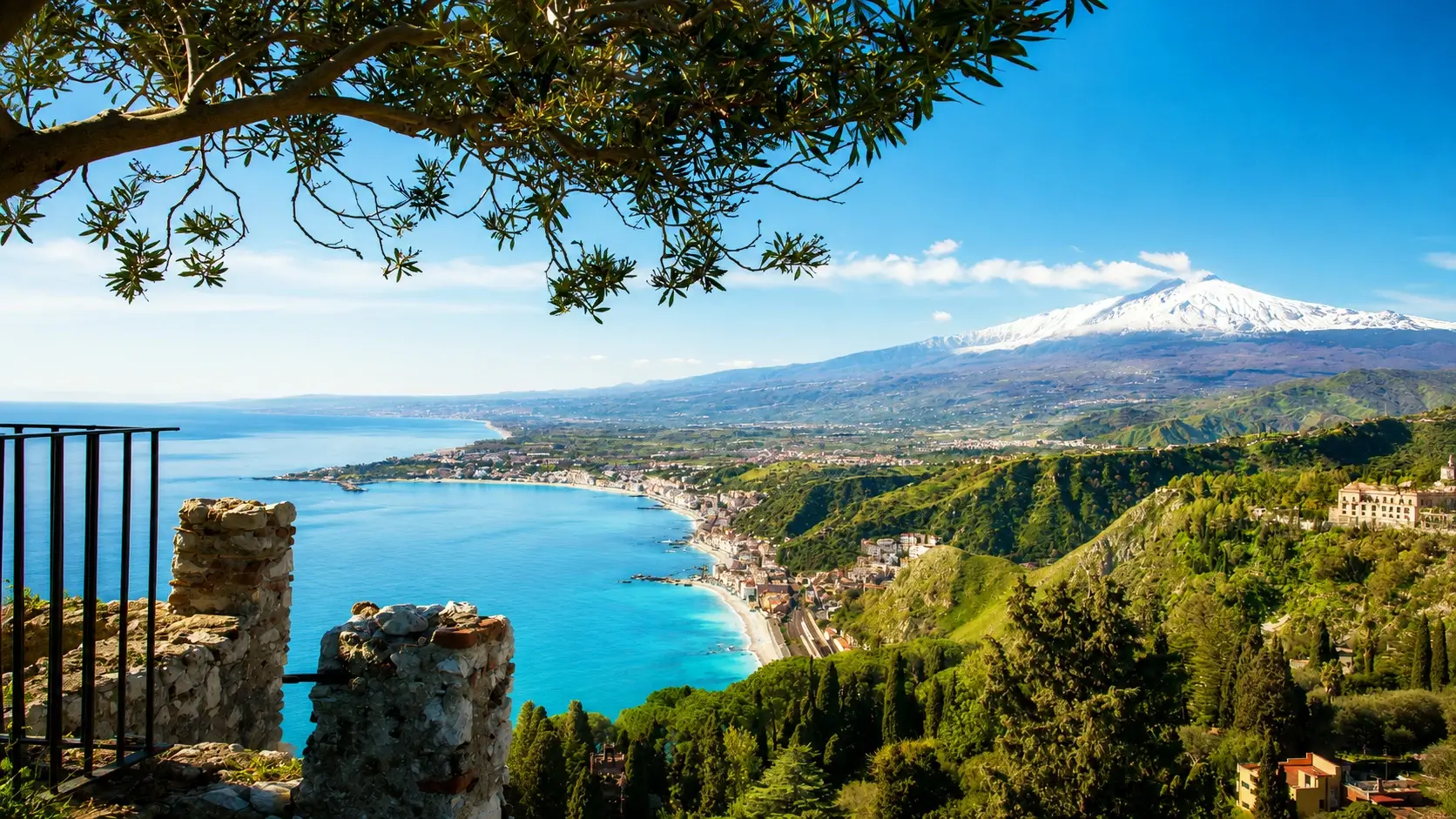 Giardini Naxos budget hotels Taormina 2026 - wide sandy beach shoreline with affordable beachfront accommodation from €64 per night, Mount Etna volcano views, family-friendly resort town, save 60% versus Taormina Centro, 10-minute bus €2-3 to Ancient Theatre, best value Sicily beach destination