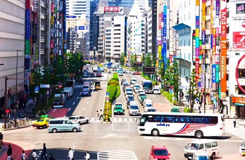 Shinjuku Tokyo family hotels 2026 - aerial view of Shinjuku Station area with family-friendly hotels, Shinjuku Gyoen National Garden green spaces, kid-friendly restaurants, JR Yamanote Line access, and Tokyo Metropolitan Government Building observation deck perfect for families with children